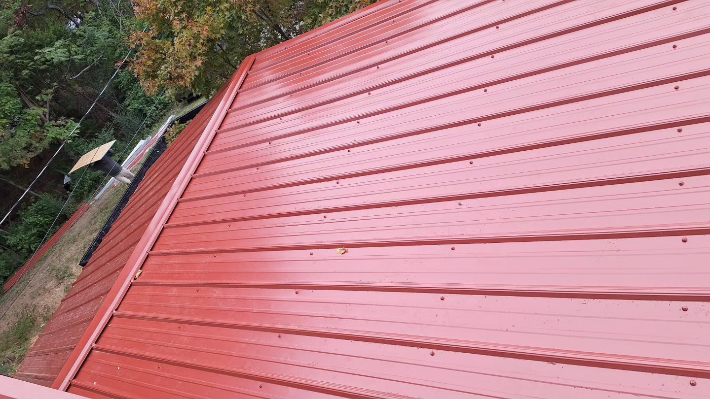 Standing-seam red metal roof on a home in East Tennessee